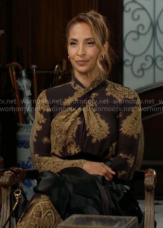 Lily's black and gold printed cross-neck dress on The Young and the Restless