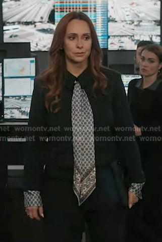 Maddie's navy jacket with print scarf on 9-1-1