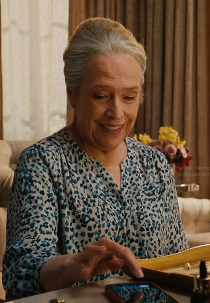 Madeline's blue floral v-neck top on Matlock