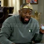 Malcolm’s green Champion sweatshirt and sweatpants on The Neighborhood