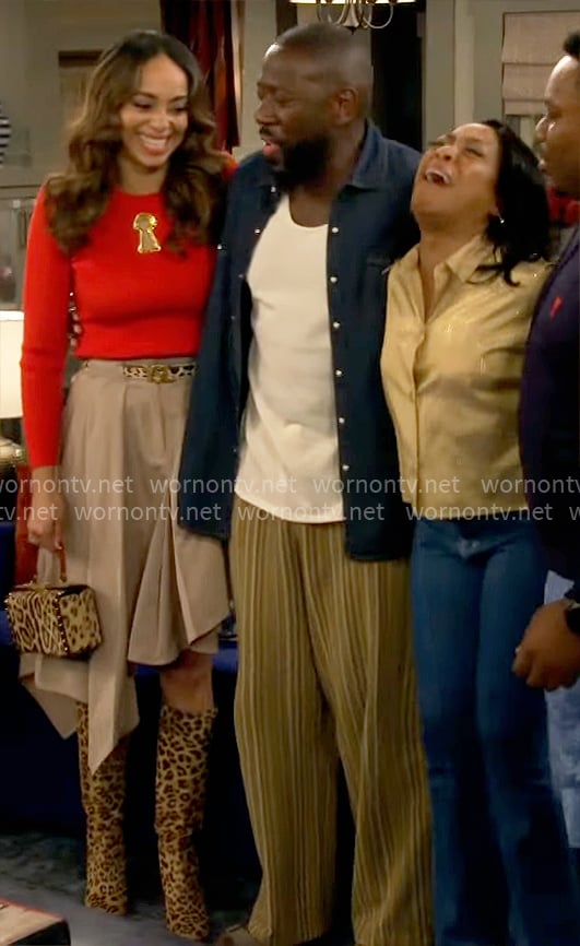 Malcolm's green striped pants on The Neighborhood