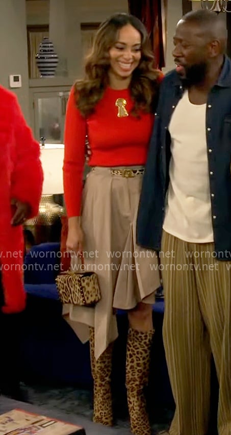 Mercedes' red key hole top and asymmetric skirt on The Neighborhood