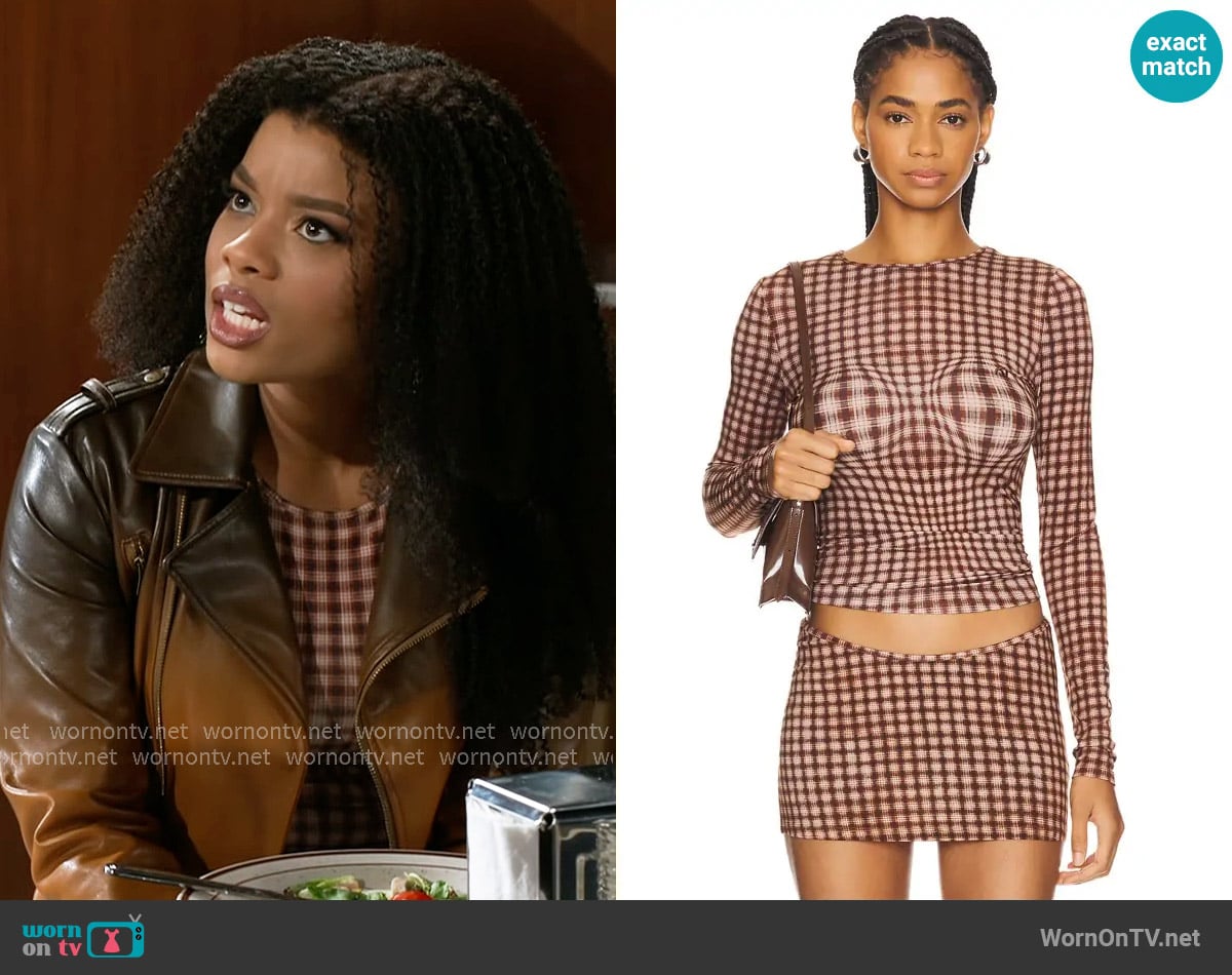 Miaou Long Sleeve Tee in Warped Plaid worn by Eva Thomas (Ambyr Michelle) on Beyond the Gates