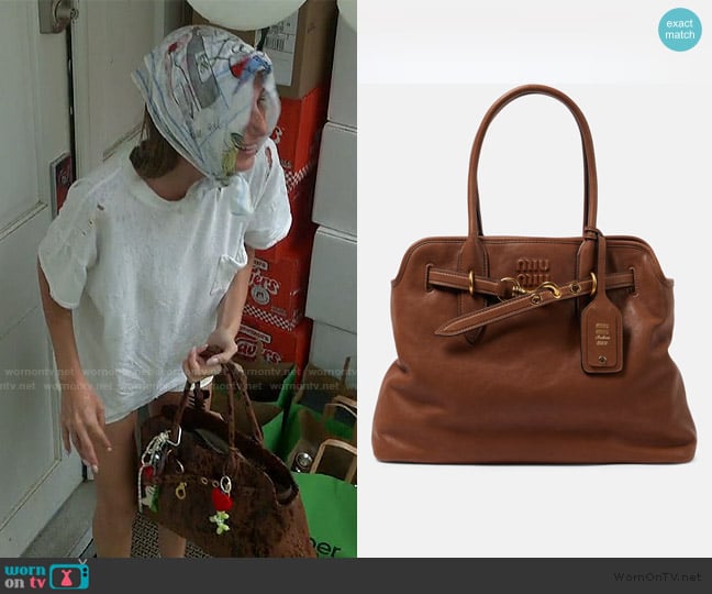 Miu Miu Aventure Medium leather tote bag worn by Amanda Batula on Summer House