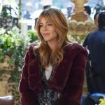 Morgan's snake print mesh top, burgundy fur jacket and blue shorts on High Potential