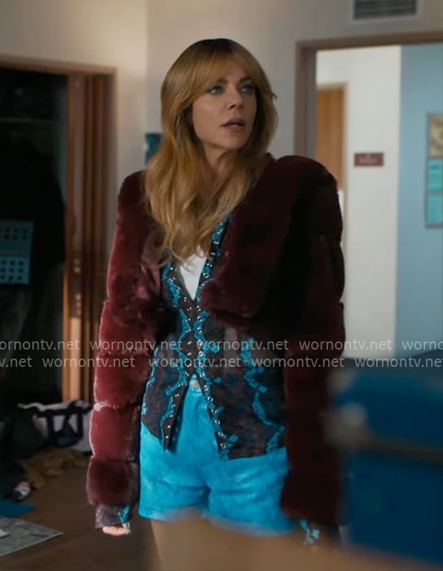 Morgan's snake print mesh top, burgundy fur jacket and blue shorts on High Potential