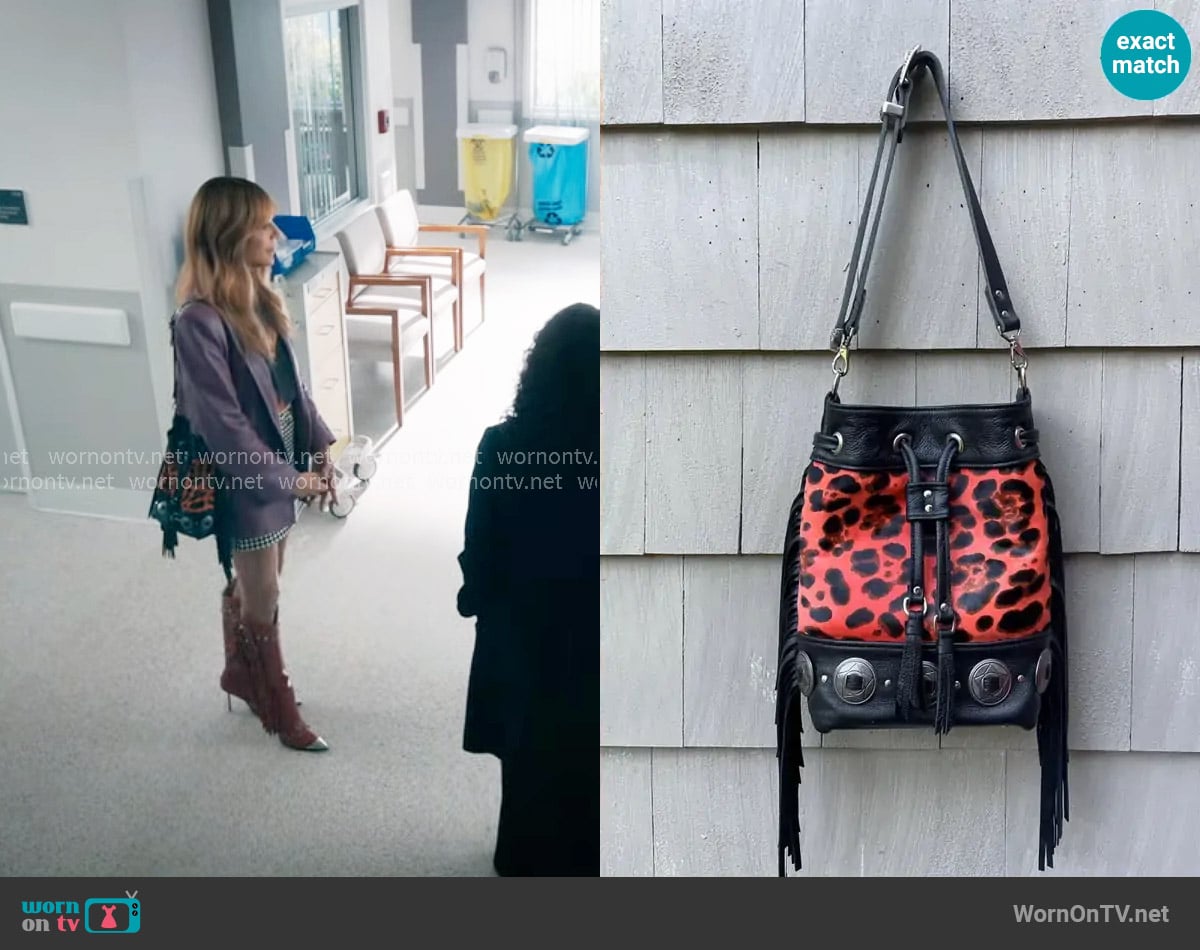 Of The Sun Leather Wild West x Wild Thing Bucket Bag worn by Morgan Gillory (Kaitlin Olson) on High Potential