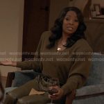 Gabby’s olive green padded shoulder sweater and leather pants on 9-1-1