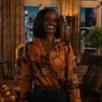 Olympia’s orange floral print bodysuit on Matlock