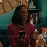 Olympia’s pink cardigan and printed pants on Matlock