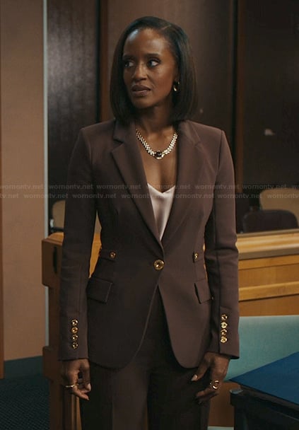 Olympia’s burgundy blazer with gold buttons on Matlock