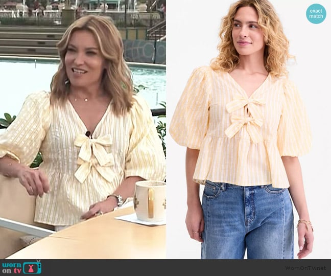 On 34th Puff-Sleeve Tie-Front Peplum Blouse worn by Kit Hoover on Access Hollywood