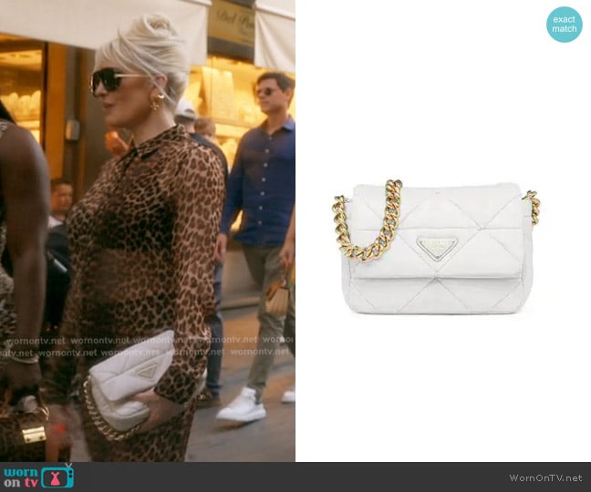 Prada System Triangle Quilted Napa Mini Shoulder Bag worn by Erika Jayne on The Real Housewives of Beverly Hills