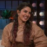 Priyanka Chopra's brown leather grommet dress on The Kelly Clarkson Show