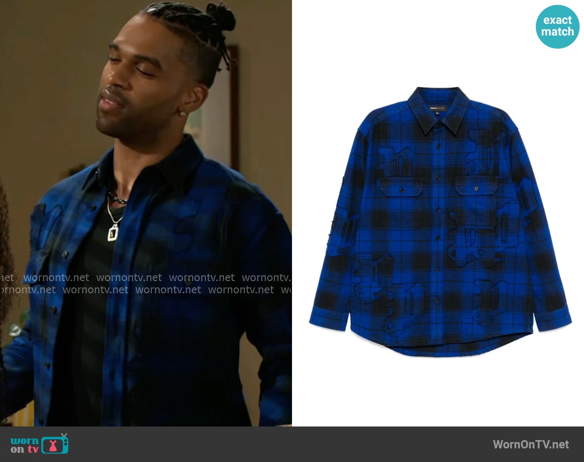Izaiah’s blue plaid shirt on Beyond the Gates