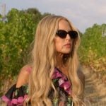 Rachel’s black print ruffle maxi dress on The Real Housewives of Beverly Hills