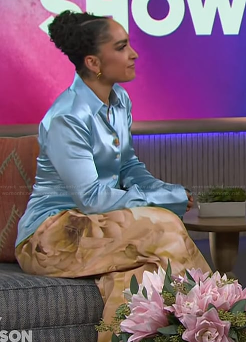 Robin Arzon’s blue satin blouse and floral pants on The Kelly Clarkson Show