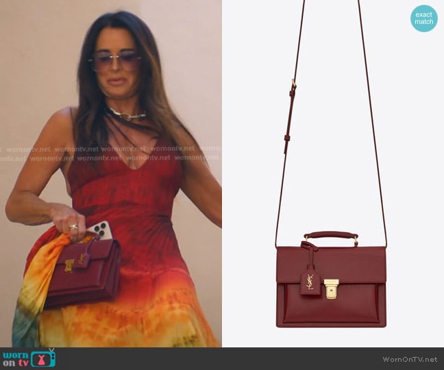 Saint Laurent High School Top Handle Bag in Oxblood Leather worn by Kyle Richards on The Real Housewives of Beverly Hills