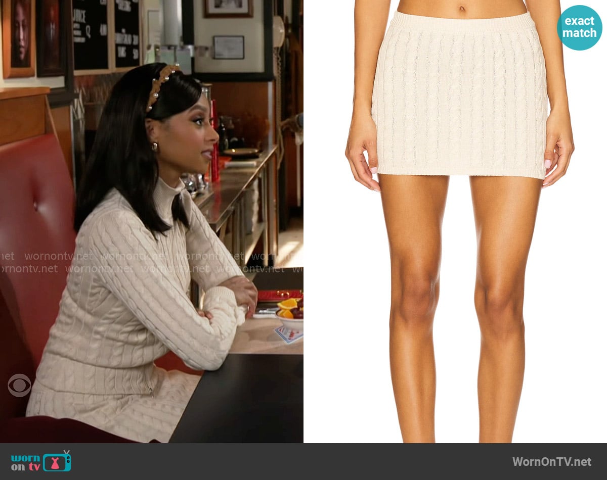 Kat’s cream cable knit skirt on Beyond the Gates