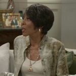 Sharon’s floral jacket on Beyond the Gates