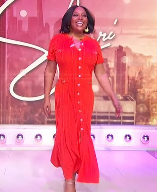 Sherri’s orange button down dress on Sherri