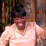 Sheryl’s pink v-neck top on The View