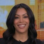 Shirleen’s black mesh sleeve tweed dress on Good Morning America