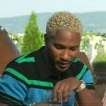 Scott's black striped polo on Access Hollywood