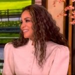 Sunny’s beige puff sleeve jacket and lace trim skirt on The View