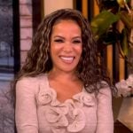 Sunny’s beige knit ruffle dress on The View