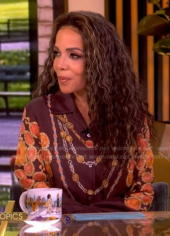 Sunny’s brown jewel print blouse on The View