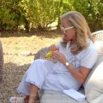 Sutton’s white floral sneakers and sunglasses on The Real Housewives of Beverly Hills