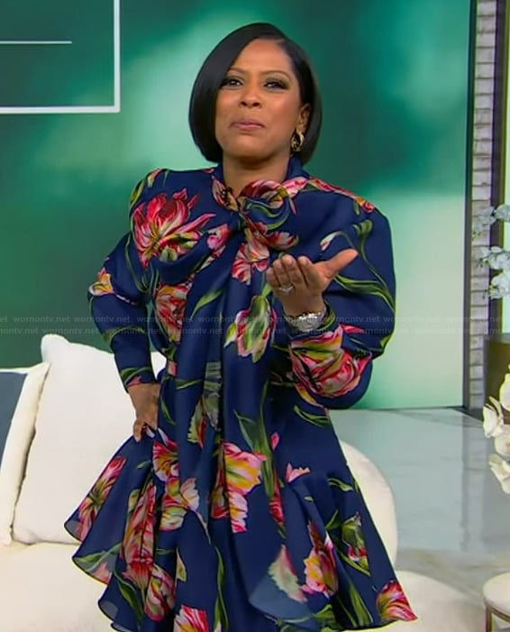 Tamron's blue floral print tie neck mini dress on Tamron Hall Show