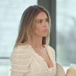 Taylor’s cream ruffled cardigan on The Secret Lives of Mormon Wives