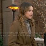 Tessa’s striped zip top and brown coat on The Young and the Restless