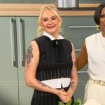 Tini Younger’s black pleated top and skirt on Tamron Hall Show