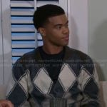 Tyrell’s argyle print cardigan on Beyond the Gates