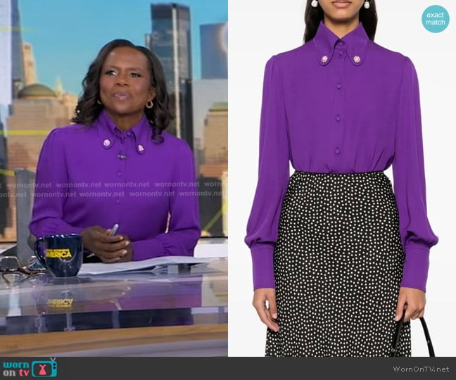 Debrah’s purple button front blouse on GMA