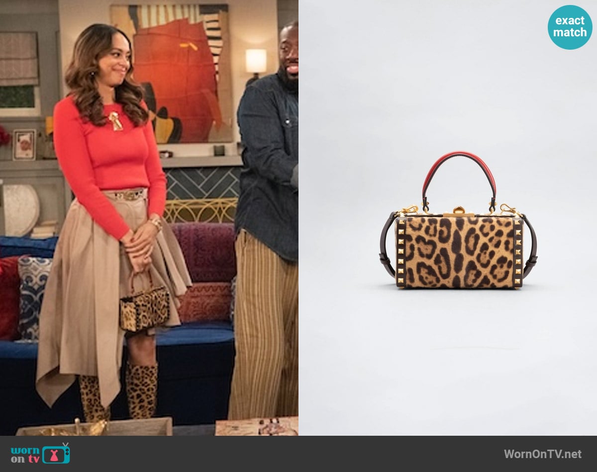 Valentino Garavani Rockstud Alcove Leopard-print Calf Hair Top-handle Box Bag worn by Mercedes (Amber Stevens West) on The Neighborhood