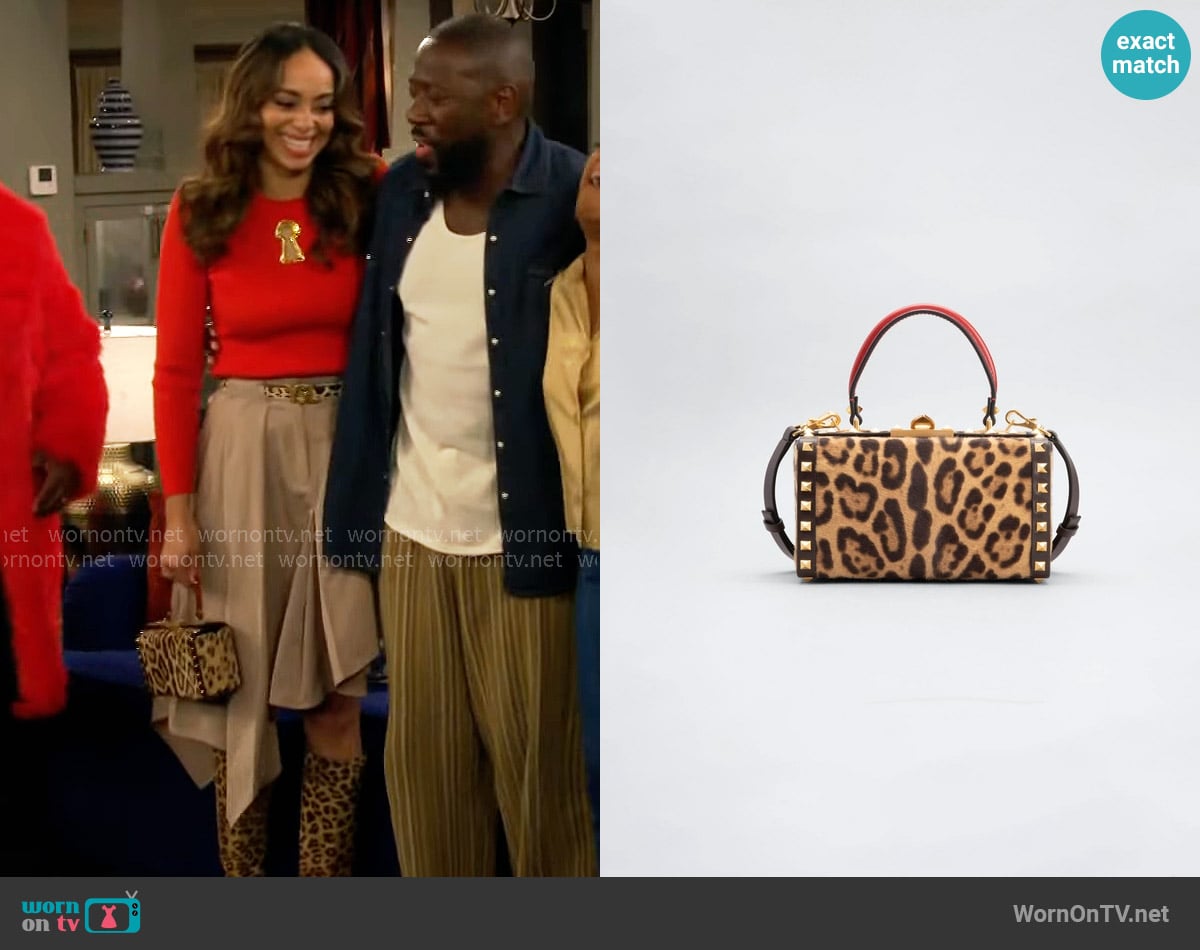 Valentino Garavani Rockstud Alcove Leopard-print Calf Hair Top-handle Box Bag worn by Mercedes (Amber Stevens West) on The Neighborhood