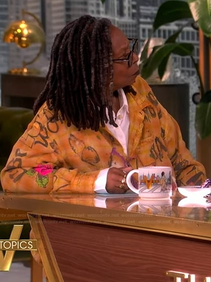 Whoopi's orange printed top on The View