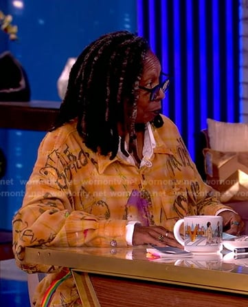 Whoopi's orange printed top on The View