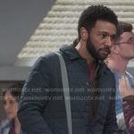 Winston’s navy quilted padded jacket and grey satchel bag on Greys Anatomy