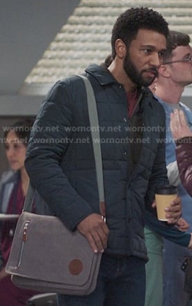 Winston's navy quilted padded jacket and grey satchel bag on Greys Anatomy
