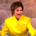 Lisa Rinna’s yellow belted jacket on The View