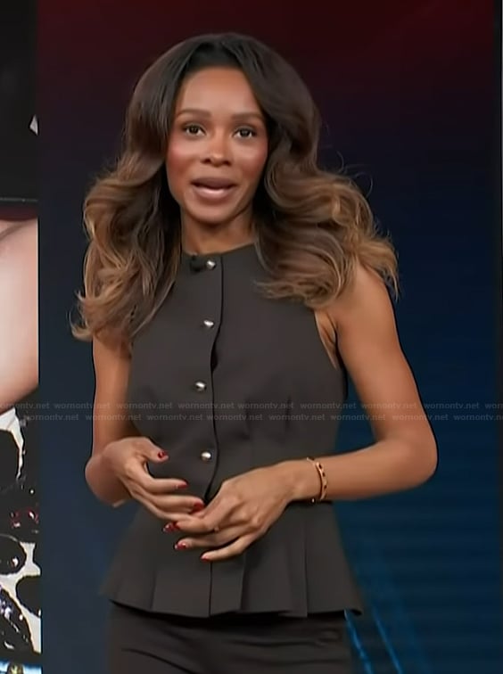 Zuri’s brown peplum vest on Access Hollywood