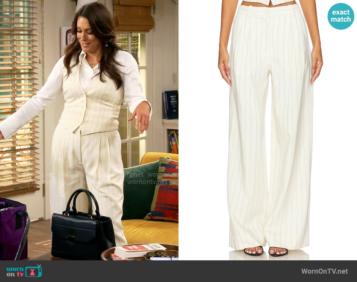 A.L.C. Alfie Pant in Cream & Black Stripe worn by Lisa Chatsworth (Angelique Cabral) on The Neighborhood