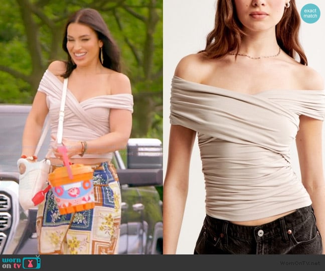 Abercrombie and Fitch Off-Shoulder White Wrap Top worn by Ashley Iaconetti on The Real Housewives of Rhode Island