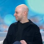 Adam Grant's navy jacket and leather sneakers on Today