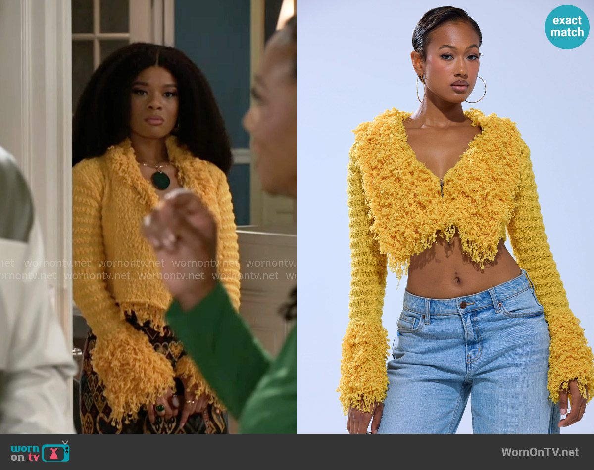 Akira Sunshine Queen Fringe Sweater worn by Eva Thomas (Ambyr Michelle) on Beyond the Gates